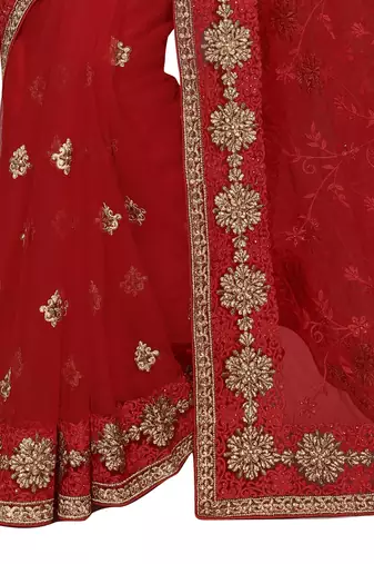 Red embroidered net saree with blouse