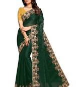 Teal embroidered satin saree with blouse