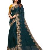 Turquoise embroidered satin saree with blouse