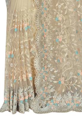 Beige embroidered net saree with blouse 2