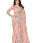 Peach embroidered net saree with blouse