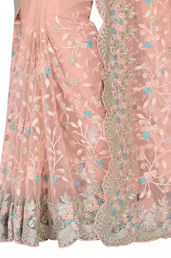 Peach embroidered net saree with blouse