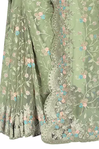 Green embroidered net saree with blouse