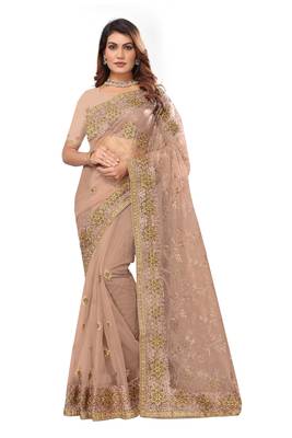 Beige embroidered net saree with blouse 1