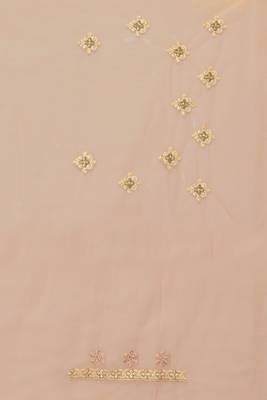 Beige embroidered net saree with blouse 4
