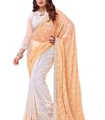 Light yellow embroidered georgette saree with blouse