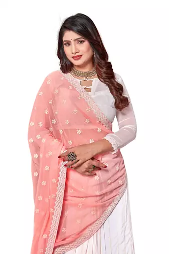 Peach embroidered georgette saree with blouse