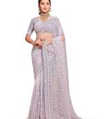 Lavender embroidered net saree with blouse