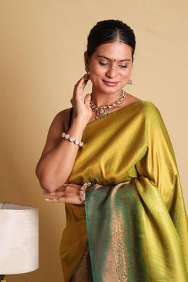 Elegant Yellow Saree with Green Zari Border and blouse 4