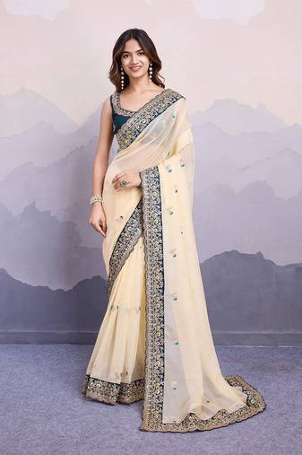 cream embroidered georgette saree with blouse