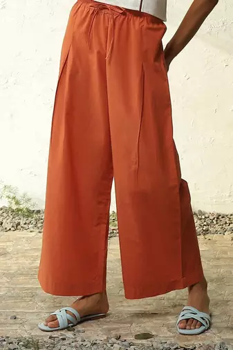 Orange poplin crimson pleated pants