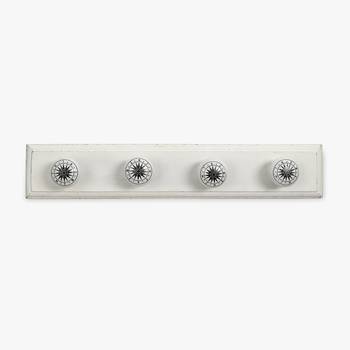 Ceramic knob hooks on board 1