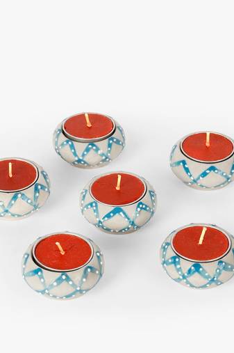Luminous clay tea light holder