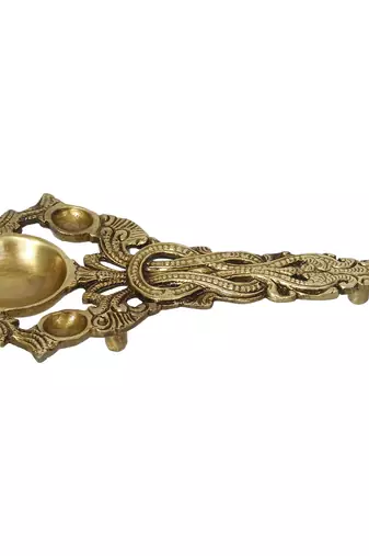 One ethnic carved 7.5 inch brass diya for pooja room and temples
