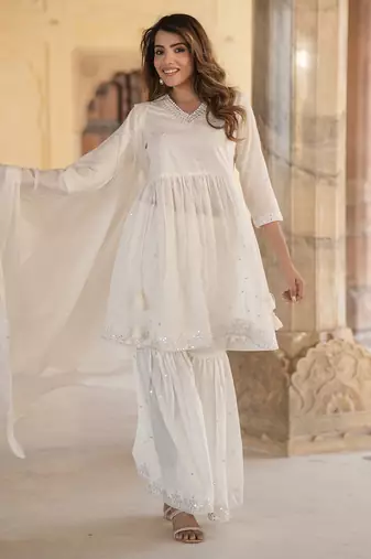 women off white a-line tiered kurta sharara dupatta set