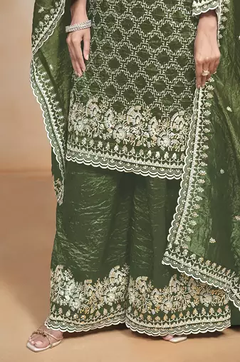 Dark green embroidered and sequins work salwar kameez