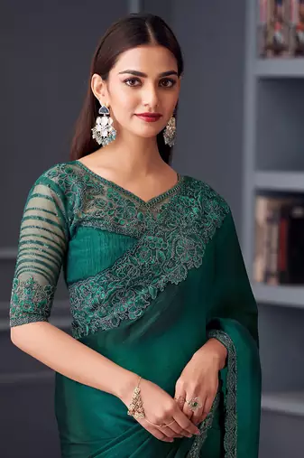 Embroidered dark teal faux chiffon saree