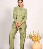 Green corset with hand embroidery