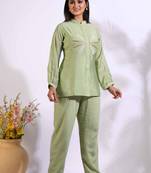 Green corset with hand embroidery