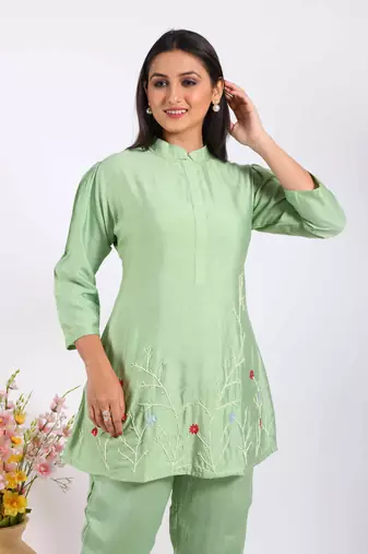 Green corset with hand embroidery