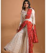 Cream sharara set attached with dupatta with hand embroidery