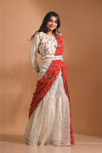 Cream sharara set attached with dupatta with hand embroidery