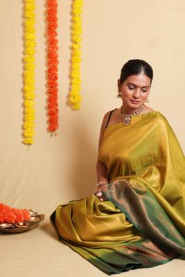 Elegant Yellow Saree with Green Zari Border and blouse 1