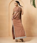 Beige georgette and net modal satin saree