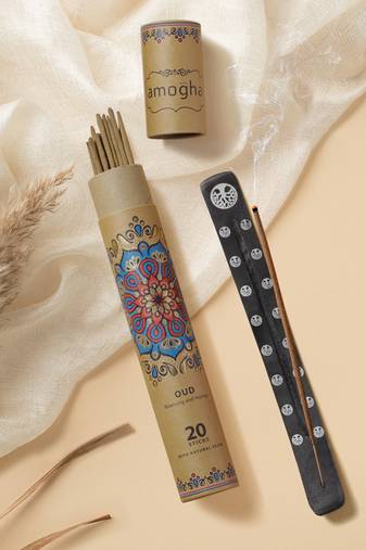 Amogha masala incense sticks in tube packing with black ashcatcher with white prints- fragrance oud