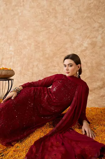 Women's semi stitched pakistani suit in maroon georgette with designer embroidery and dupatta