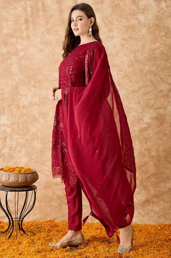 Women's semi stitched pakistani suit in maroon georgette with designer embroidery and dupatta