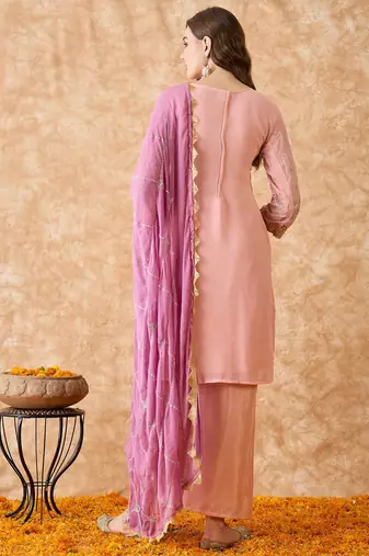 Women's semi stitched pakistani suit in peach georgette with beautiful embroidery and dupatta