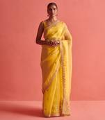 Yellow hand embrodiered saree with mashru silk blouse