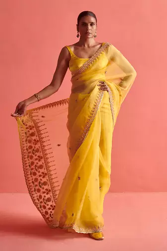 Yellow hand embrodiered saree with mashru silk blouse