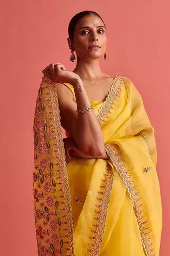 Yellow hand embrodiered saree with mashru silk blouse