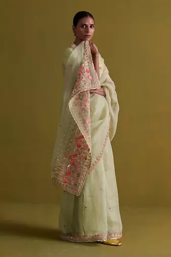 Sage green hand embrodiered saree with raw silk blouse