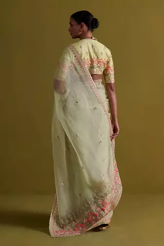 Sage green hand embrodiered saree with raw silk blouse