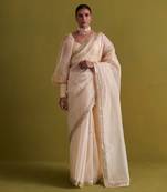 Beige hand embrodiered saree with raw silk blouse