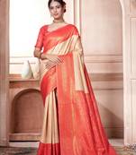Beige woven kanchipuram silk saree with blouse