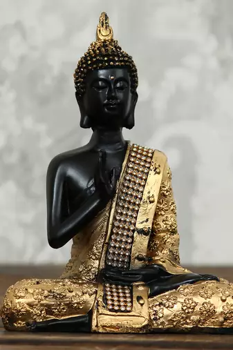 One handcrafted meditating blessing buddha