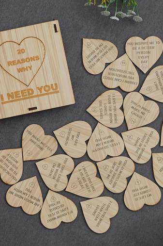 One "20 reasons why i need you" printed on little hearts valentine brown wooden gift set