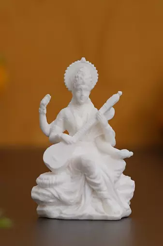 One white polyresin goddess saraswati statue
