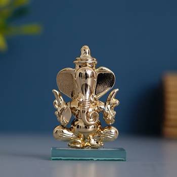 One golden lord ganesha crystal statue for home and car dashboard 1
