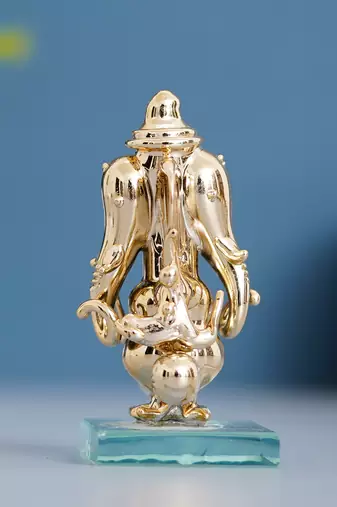One golden lord ganesha crystal statue for home and car dashboard