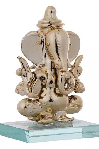 One golden lord ganesha crystal statue for home and car dashboard