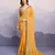 Glamorous yellow embroidered georgette indian designer saree for weddings parties and traditional occasions