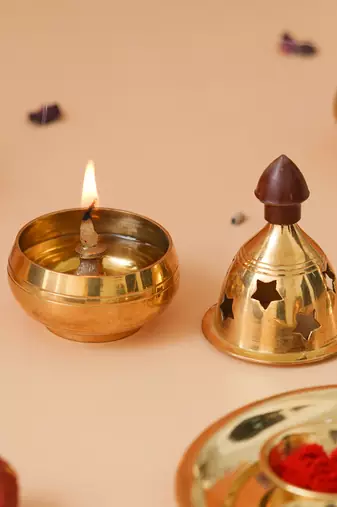 One golden traditional akhand brass diya