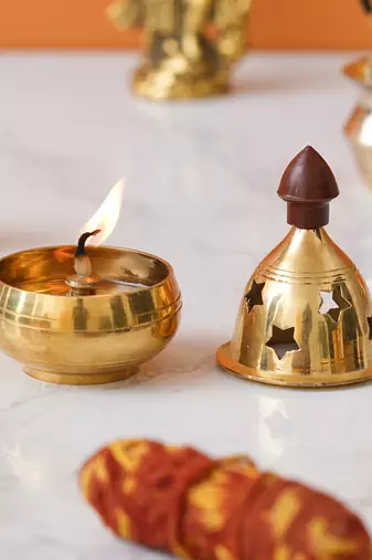One golden traditional akhand brass diya