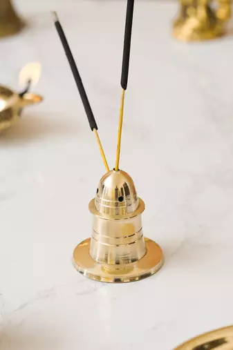 One golden brass incense stick holder agarbatti stand