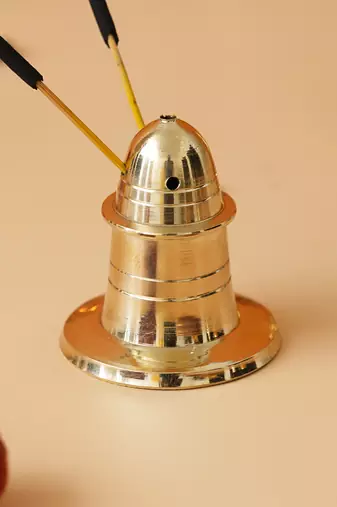 One golden brass incense stick holder agarbatti stand